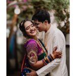 Arjun Kamath Instagram - The sun was gentle in the crystal blue skies of Maharashtra when I found myself in the charming city of Solapur. Perched on the Maharashtra-Karnataka border, the town is unique in its blend of Kannada, Marathi, and Telugu cultures. Tied together in a seamless symphony, they reflect the region’s lifestyle and celebrations. Given its cultural milieu, I was excited to document Priyanka and Aniket’s wedding, eager to bring a refreshing flavour into the photographs. The momentous day unfurled in both serenity and exhilaration. As Priyanka adorned a silken saree of pink and blue with delicate gold ornaments, I took the opportunity to capture a few tasteful bridal portraits in natural sunlight before the ceremonies took over. And before we knew it, we could hear the parrots chirping in gaiety on one hand, and on the other, the shehnais wove a celebratory layer to the cool air. The magnificent sun sprayed patterns of gold and copper over it all, painting a lovely wedding scene aptly complimented by the rituals, which reeled in both worship and light-hearted banter. And just minutes after the rituals had concluded, squeezed in a few serene moments with the bride and the groom. Together, we walked around the wedding venue, which was sprinkled with patches of lush greenery, finding a rustic frame here and a vivid one there. As the sun danced across the clouds and shone on Priyanka, she looked nothing short of an Indian goddess, whilst Aniket complimented her gracefully in a silken white kurta, holding Priyanka in an embrace of warmth, happiness, and promise. Looking back at the beautiful and vivid wedding, a few moments stood out in my memory, splayed with golden sunlight, eternal grace, and unending love. I’m sharing them here, hoping to remember these moments for years to come. Priyanka and Aniket, Solapur - Dec ‘22 @canonindia_official #bride #portrait #sunrise #indianbride #wedding #weddingday #weddingsaree #bridalhair #bridaljewellery #weddingphotography #couple #brideandgroom #together #DoGreatWithCanon #MentorsInFocus #EOSMaestro #instagram #arjunkamathphotography