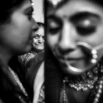 Arjun Kamath Instagram - Oh what an honour, to chronicle the purest love and all the emotions it brings. @shirish_p07 and @nidhi11_1991 ’s wedding ceremony was studded with all things glimmery and beautiful. A starry sky blessing the couple as they took pheras, a reverie of dance and music taking over the air, and the loved ones rejoicing galore. It was a true delight to be in the middle of all the celebration. Little did I know that the most heartwarming moments were yet to unfold. As the rituals approached an end, the moon rose further over our heads and it was time for the bride’s bidaai. Within a few moments, the air seemed to take a tender and poise turn as Nidhi began to bid her goodbyes. Pearly tears were followed by the most endearing smiles and words of love. And it was then that I took these photographs, that I feel encompass all the love that floated in the air. It is indeed a stroke of fortune that my work allows me to freeze such delicate, fleeting moments in time. It makes all the difference to the artist in me. #CapturedOnCanon with a @canonindia_official EOS R5 with a Canon RF 24-70mm F2.8 L Lens and lit with the help of @profoto B10’s diffused through a soft box. @srishtidigilife @canonindia_official @profoto #weddingphotos #weddingphotography #wedding #weddingday #indianwedding #love #bride #groom #bidaai #emotional #tears #mother #daughter #motherlove #weddingphotographer #blackandwhite #arjunkamathphotography #bangalore #DoGreatWithCanon #MentorsInFocus #EOSMaestro #instagood #instagram Heritage Khirasara Palace