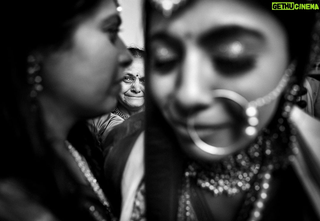 Arjun Kamath Instagram - Oh what an honour, to chronicle the purest love and all the emotions it brings. @shirish_p07 and @nidhi11_1991 ’s wedding ceremony was studded with all things glimmery and beautiful. A starry sky blessing the couple as they took pheras, a reverie of dance and music taking over the air, and the loved ones rejoicing galore. It was a true delight to be in the middle of all the celebration. Little did I know that the most heartwarming moments were yet to unfold. As the rituals approached an end, the moon rose further over our heads and it was time for the bride’s bidaai. Within a few moments, the air seemed to take a tender and poise turn as Nidhi began to bid her goodbyes. Pearly tears were followed by the most endearing smiles and words of love. And it was then that I took these photographs, that I feel encompass all the love that floated in the air. It is indeed a stroke of fortune that my work allows me to freeze such delicate, fleeting moments in time. It makes all the difference to the artist in me. #CapturedOnCanon with a @canonindia_official EOS R5 with a Canon RF 24-70mm F2.8 L Lens and lit with the help of @profoto B10’s diffused through a soft box. @srishtidigilife @canonindia_official @profoto #weddingphotos #weddingphotography #wedding #weddingday #indianwedding #love #bride #groom #bidaai #emotional #tears #mother #daughter #motherlove #weddingphotographer #blackandwhite #arjunkamathphotography #bangalore #DoGreatWithCanon #MentorsInFocus #EOSMaestro #instagood #instagram Heritage Khirasara Palace