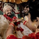 Arjun Kamath Instagram - Chaitra and Kunal’s wedding ceremony was straight out of a fairytale. The wedding dais was fragrant with elaborate designs of roses and jasmines, friends and family were blithely immersed in the celebration, and the ravishing couple were on cloud nine throughout the day. Sharing two of the many precious moments that I captured on their big day in the transcending green milieus of the Tamarind Tree, Bangalore. Their wedding brought all the serendipity to the artist in me, wrapped in shades of emerald green and the sparse warming silken reds, engulfed in laughter with a few tender moments of silence and grace. Chaitra + Kunal, December 2021 #CapturedOnCanon with a @canonindia_official EOS R5 and a CanonRF 24-70 f/2.8 L USM. Lit with the help of two @profoto B10’s at different intensities(diffused using soft boxes). @srishtidigilife @canonindia_official #weddingphotography #weddingphotographer #indianwedding #weddingdecoration #weddingphotos #bangalorewedding #bride #groom #mangalsutra #roses #jasmine #brideandgroom #bridalsarees #arjunkamathphotography #bangalore #DoGreatWithCanon #MentorsInFocus #EOSMaestro #instagood #instagram The Tamarind Tree