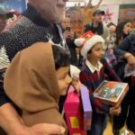 Arnold Schwarzenegger Instagram - There is a reason I have been handing out presents at the @hollenbeckyouthcenter in Boyle Heights for over 30 years. When I first came to America, my friends at Gold’s Gym were so generous. They brought me in during Christmas time and made me feel so happy and included. I love being able to give back and see the smile on the kids’ faces when they get their gifts. Merry Christmas!
