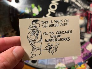 Augustus Prew Instagram - Playing Gay Monopoly on Fire Island with some of my chosen family is truly what life is all about and exactly what nature intended. Thank you Weather Queen for honoring our games night with a dramatic storm, it added the chicest snuggliest backdrop to our games night. Love ya girl.
Quick bit of history- Gay Monopoly was an unofficial tongue in cheek version of monopoly developed by “The Parker Sisters”- truly some of the wittiest writers of all time (see “You were caught eating quiche”card) in 1983 to raise money to fund AIDS research which at the time was already devastating the gay community and which very little was being done to prevent by the (straight) powers that be (google Larry Kramer/Eric Sawyer/Anthony Fauci). You could buy it in stores and everything until Parker Brothers (owners of the actual monopoly game) sued them for copyright infringement because a)they are homophobic capitalists (ironic also given that the game was initially created to warn against capitalism) and b) they are boring (see Straight City photo to understand that reference). It’s now a really rare gem of a game so if you have/find one, look after it with all your heart and keep it close because it has immense historic significance. My favorite part of the game is the “Do you know your queer history?” card, where if you land on it have to answer a question about influential queer people throughout history- I learned about George Washington Carver, HansChristian Andersen and Benjamin Britten and was reminded of the passage in the Bible that tells us that King David loved his boyfriend Jonathan “surpassing the love of a woman” in the book of Samuel. Yes that’s actually in the Bible so you can keep that one for your next holiday season. Oh and the Benjamin Britten was gay. Didn’t know that either. Playing it amongst the ghosts of Fire Island (many many many queer people died of AIDS here- most had nowhere else to go) and a mere block from the house of Patient Zero (the first known person to be infected by the HIV virus) was profound to say the least. I love y’all. Look after after each other. Queer people are so powerful. We always have been and we always will be 😘🌈❤️