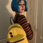 Avi Lake Instagram - Can anyone guess what my favorite movie is? Happy Halloween!! 🎃💙🐈‍⬛ #coraline