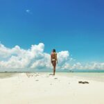 Beau Garrett Instagram - I travel alone because it scares the shit out of me as much as it reminds me that though I am large in my own life, I must humbly bow down to being smaller in the bigger picture of it all. To travel wakes me up, it shakes me to my core, it resets me , it ignites me and it brings me a great sense of peace. To those of you that understand these words, you are my unspoken tribe. We may be oceans apart but we are all connected by this great mass of water we get to swim through.
