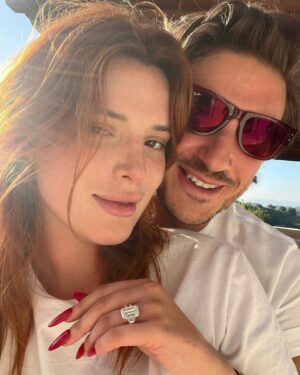 Bella Thorne Instagram - @bellathorne is engaged! The actress and director has found love with entrepreneur Mark Emms, the producer behind #BadVegan and the co-owner of New York City hotspot the @themulberrybar. The two met last year on the beach in Ibiza at #CaraDelevingne’s birthday party, and according to Thorne, “It was love at first sight as the sun rose.”

Tap the link in our bio for all the details.