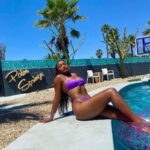 Bethany Clayton Instagram – Hot as hell 🥵 @oneoneswim 💜 Palm Desert, Palms Springs