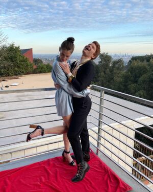 Brendan Scannell Instagram - It’s not a Hollywood premiere without a red beach towel and two covid tests babes!! Go watch @bondingnetflix ya freaks! Jacket vintage @moschino and pants sewed by me with fabric from the one and only @joann_stores of Glendale, CA