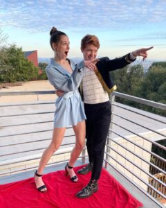 Brendan Scannell Instagram - It’s not a Hollywood premiere without a red beach towel and two covid tests babes!! Go watch @bondingnetflix ya freaks! Jacket vintage @moschino and pants sewed by me with fabric from the one and only @joann_stores of Glendale, CA Hollywood, California
