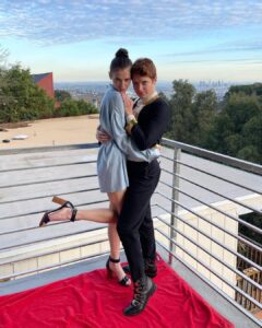 Brendan Scannell Instagram - It’s not a Hollywood premiere without a red beach towel and two covid tests babes!! Go watch @bondingnetflix ya freaks! Jacket vintage @moschino and pants sewed by me with fabric from the one and only @joann_stores of Glendale, CA Hollywood, California