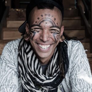 Brennan Lee Mulligan Instagram - This past week we said goodbye to Tigre Mashaal-Lively. It feels woefully inadequate to try and capture with words Tigre’s uncapturable spirit. They were explosively joyful, unyieldingly playful, yet when they were listening to you, they were as calm and comforting as a starry sky. They had a heart bigger than the world. Their birthday punches (camp tradition, punches lovingly administered to the arm on one’s birthday) were the stuff of legends: their knuckles seemed to pass through muscle like vapor, to land instead with thunderous intensity on the bone itself. They created worlds out of foam and fabric, paper, steel and wood. Their work still hangs in the Wayfinder office, rests on its shelves, waiting with each new summer to spring into the forests and bring the magical to the mundane yet again. How many campers had their journeys to realms of myth and legend sped on by the incredible artistry of our friend? Every community Tigre touched, from Wayfinder to Burning Man, they transported and transformed. They taught me and so many of my loved ones how to play without reserve, dance without apology, love without self-doubt, and to be wholly and truly oneself.
 
I can think of no better example than Tigre of how often deep insight into the human experience is accompanied by silliness, playfulness and a deep love of the absurd. I can’t describe how powerfully loving and protective their energy was, and yet how they were only ever a *moment* away from wrestling you to the ground and sitting on your head, often to uproarious applause and laughter. A perfect person.
 
Tigre, I’ve been trying to write the words that would let me hold onto you, like if I could turn the phrase correctly then maybe some essential part of you would still be here: That if I could describe you exactly as you were, then maybe you’re not really gone, right? I don’t know how to reconcile that desire to hold on with the knowledge that you were beyond description, that you contained more love and joy and wisdom than anyone could ever hope to record. So at the end of the day, I think my biggest, truest feeling is simply this: I really, really miss you, and I wish you were still here.