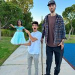 Brent Rivera Instagram - I spent 24 hours with the world’s shortest woman and America’s tallest man😱 YouTube video is out now❤️ Disneyland
