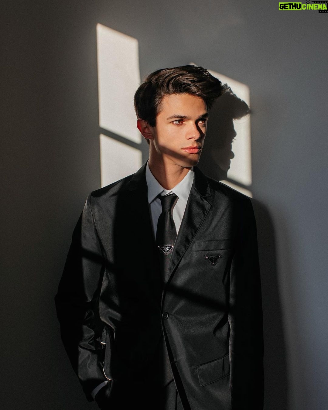 Brent Rivera Instagram - All dressed up in black and white💖 make sure to watch the first #PradaFW21 men’s fashion show by Miuccia Prada and Raf Simons on @Prada social channels😍