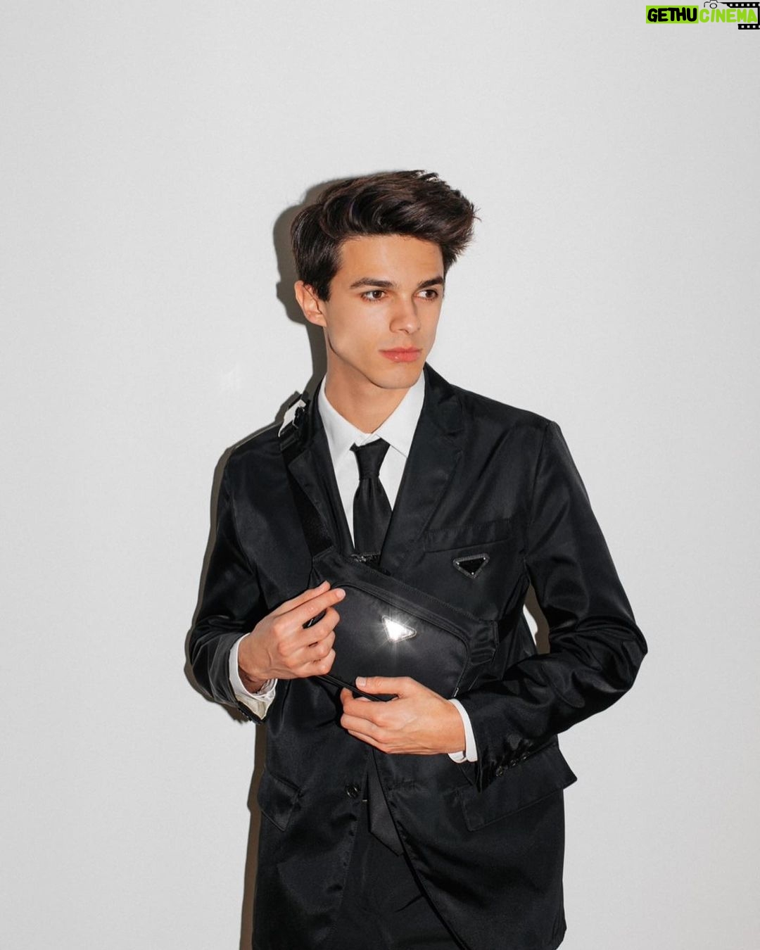 Brent Rivera Instagram - All dressed up in black and white💖 make sure to watch the first #PradaFW21 men’s fashion show by Miuccia Prada and Raf Simons on @Prada social channels😍