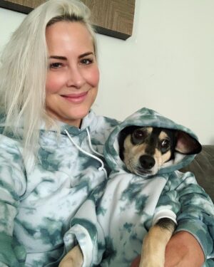 Brittany Daniel Instagram - This is where I’ll be over the holidays.Thank you @courtneytallmanhair for the perfect Christmas gift.You know me so well. Matching sweats by @realcutecreative #owningit #doggiesweatshirt #purelove #myboytj