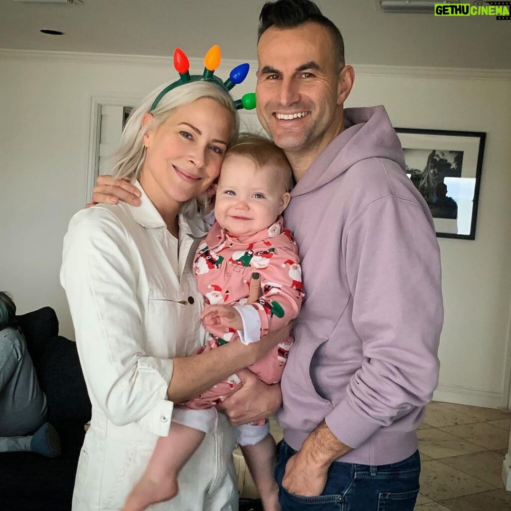 Brittany Daniel Instagram - Merry Christmas from our wild and wonderful family. Being with you all made my year and having our baby Hope is the most special present ever. We love you Hope. @adam.touni #merrychristmas