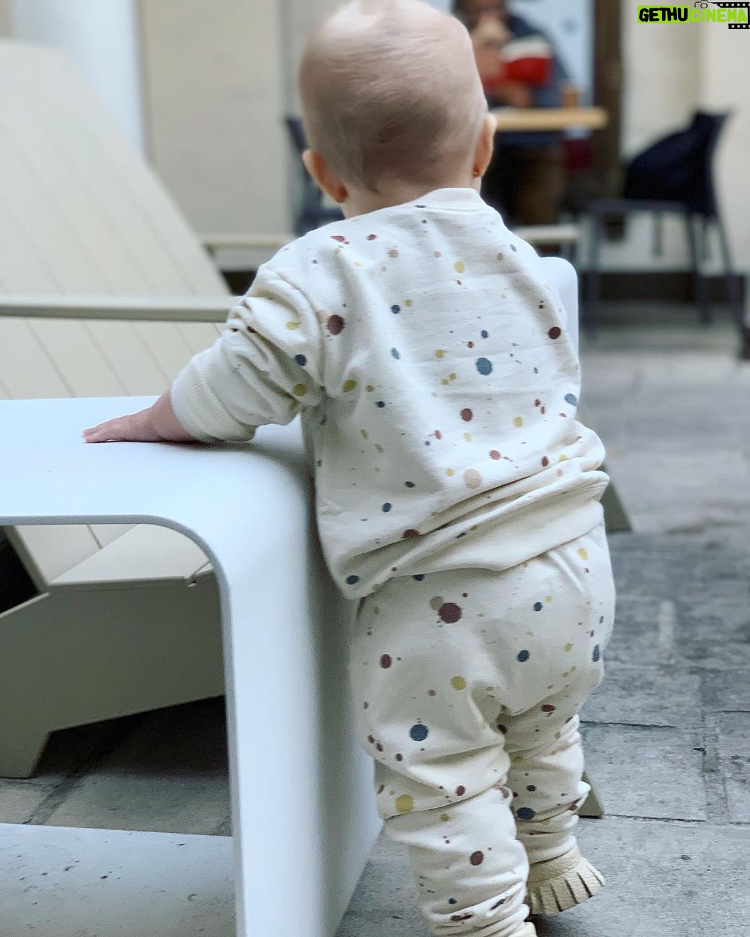 Brittany Daniel Instagram - Our little chubby cheeks is 11 months old. Also dying over this splatter paint sweatsuit by @ryleeandcru 😍
