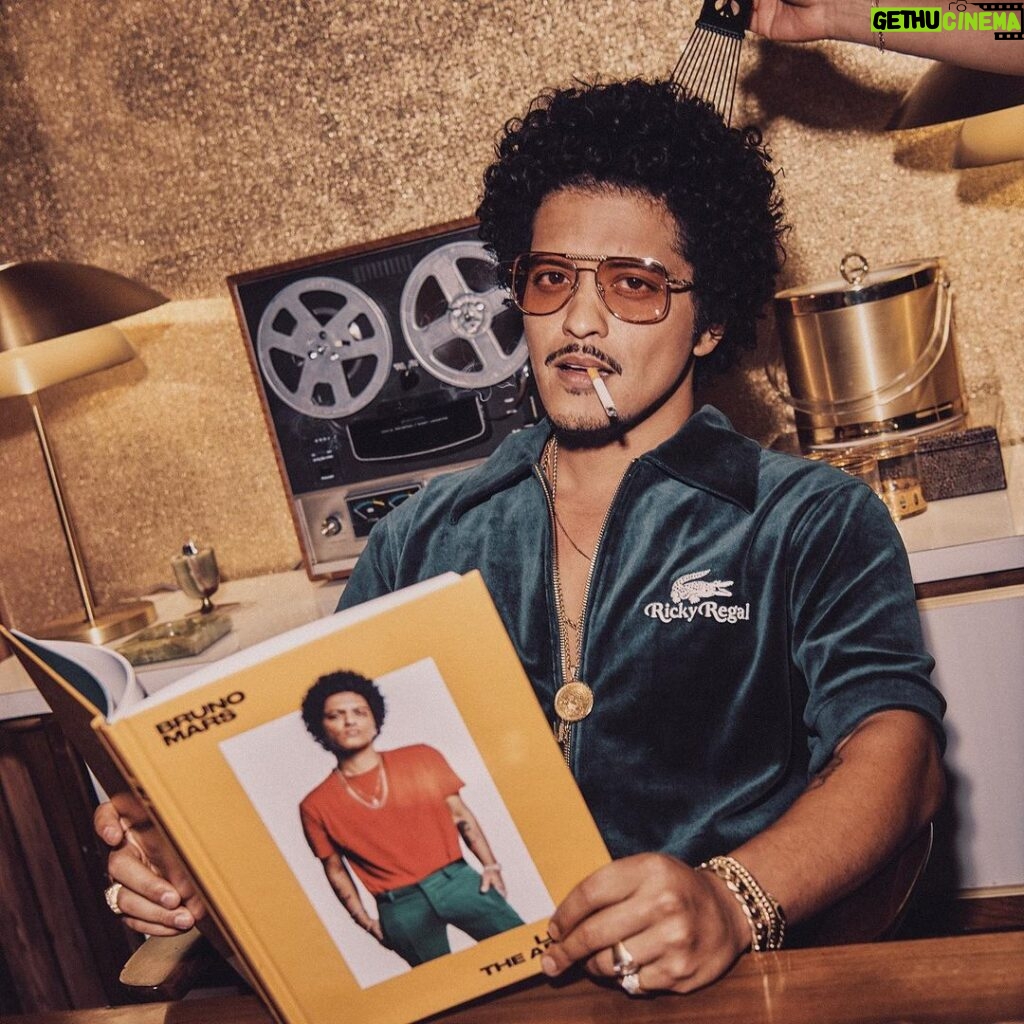 Bruno Mars Instagram - A man once told me to stay humble. I fired that man. Lacoste X Ricky Regal Drops online tomorrow! 💼