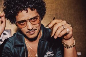 Bruno Mars Instagram - When i’m on stage I go by Bruno Mars. When i’m making lavish luxurious garments, I go by @RickyRegal. Thank you @Lacoste 🐊 Im a fashion designer now! Catch me at a fabric store near you 🧵🪡