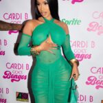 Cardi B Instagram - Effortlessly… 💚🐊
