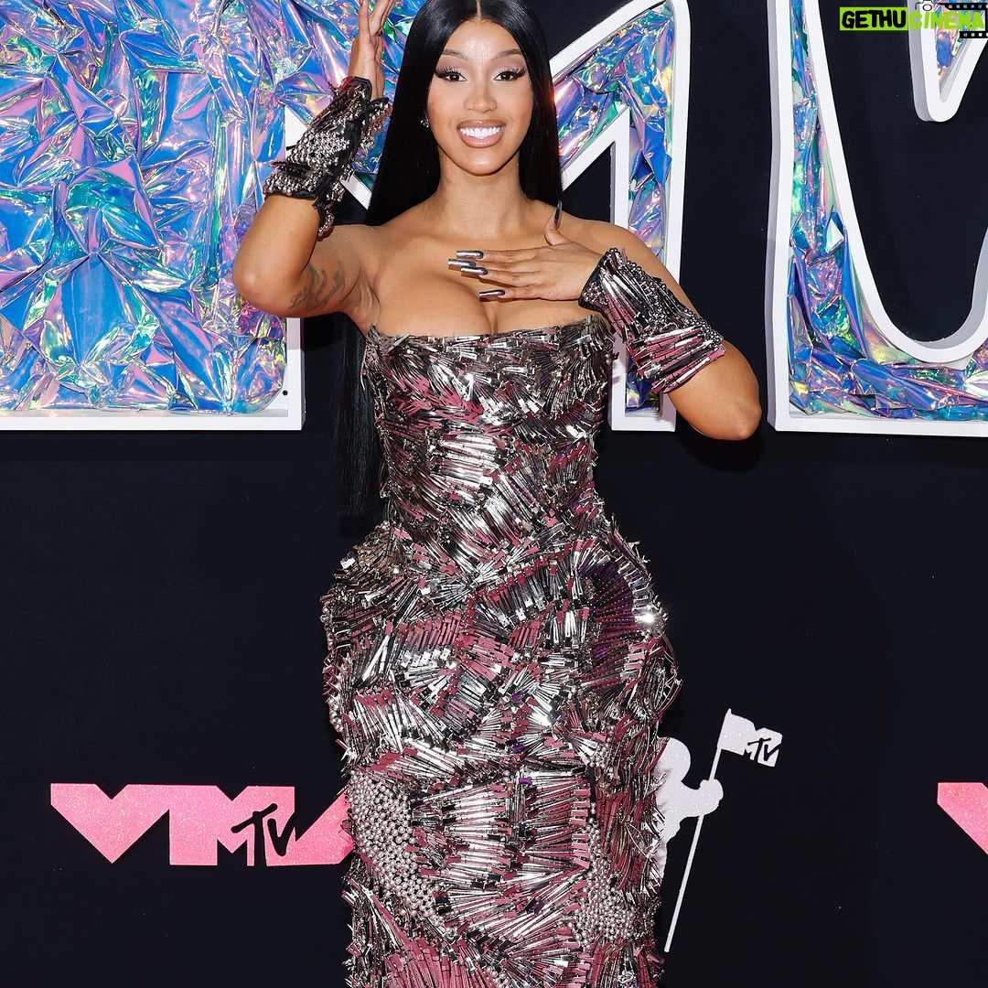 Cardi B Instagram - I can body every look and I can body every pose