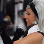 Cardi B Instagram - Soooo beautiful yet sooo edgy .I was afraid of doing the Grey hair but I went for it and it looked amazing….Thank you @chenpengstudio for this amazing dress & @laureldewitt for the earrings 🖤♠️🕷️