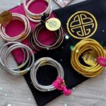 Catherine Bell Instagram - I have been obsessed with my gold @budhagirl bracelets for MONTHS! I sleep in them, ocean, shower … with workout clothes or fancy dresses! And they’re so light! They look like solid gold but are good plated over the lightest plastic! Yet somehow indestructible! You don’t even feel them!! And now I have every color! Thank you @budhagirl ❤️❤️❤️