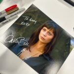 Catherine Bell Instagram - That Good Witch witchy stare !! Who knows which movie or season this is from?? (Love when fans bring unique photos for me to sign!) ❤️ @thats4ent #Christmascon #goodwitch