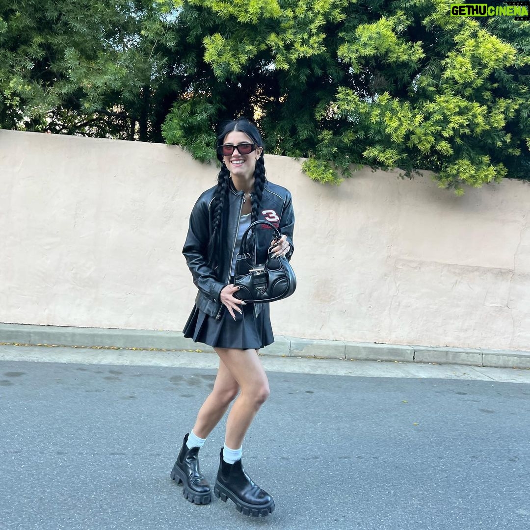 Charli D'Amelio Instagram - the iconic 2000’s model takes a new form 🖤 @prada #pradamoon
