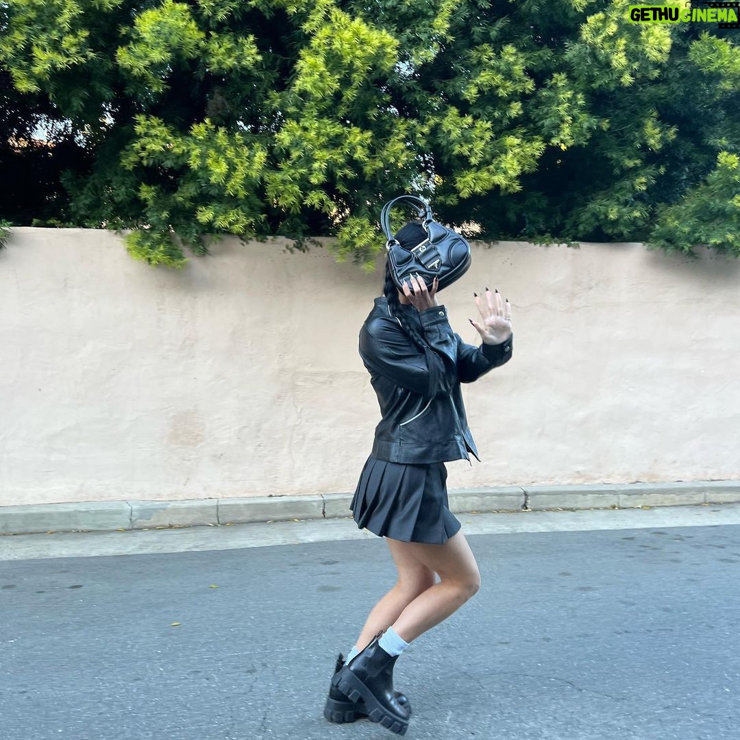 Charli D'Amelio Instagram - the iconic 2000’s model takes a new form 🖤 @prada #pradamoon