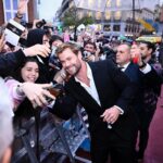 Chris Hemsworth Instagram - After years of coming to Spain and being asked “has my Spanish improved” I can safely say it’s in the palm of my hand. Thanks so much to everyone who turned up for the Extraction 2 premiere . Don’t miss it June 16 only on @Netflix @samhargrave @golfarahani @olgakurylenkoofficial @therussobrothers @wildstateprod