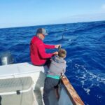 Chris Hemsworth Instagram - My son wanted to catch a fish for the locals in Fiji and after 3 attempts and about 12 hrs at sea we pulled in this beauty. Fed the village for 3 days. Ps if your wondering why my son calls me Chris it’s because I’m his BFF and true mates don’t call each other dad @tavaruaislandresort