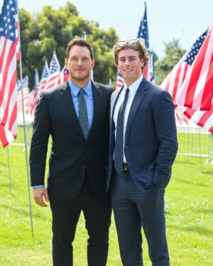 Chris Pratt Instagram - Today, let’s take a moment to remember and honor the lives lost on September 11, 2001. 🇺🇸 It's a day that changed our world forever, but it also showed us the strength and resilience that define the American spirit. 

I had the honor of planting the last flag at the Waves of Flag Ceremony today at @Pepperdine. Each flag represents an innocent life lost on that day, including a national flag for each foreign country that lost a citizen in the attack.

As we look back on the events of that fateful day, let's remember the heroes – the firefighters, police officers, first responders, and ordinary people who risked everything to help their fellow citizens. 🙏🏼 Their courage and selflessness continue to inspire us all.

Let's also pay tribute to the families who were forever changed by this tragedy. Your strength and the way you've come together as a community is a testament to the unbreakable bonds of love.

Photo credit: Courtesy of Pepperdine