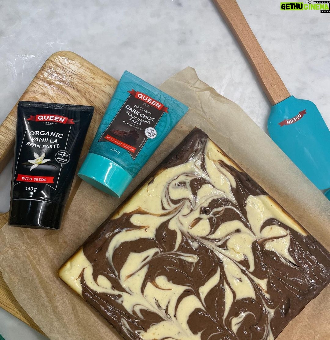 Chrissie Swan Instagram - Queen Task: Make Cheesecake Bars! These were so impressive in the end and I felt very up myself because of the way they look all swirly and marbley 😜 This Queen Natural Dark Choc Flavouring Paste is so chocolatey and so much easier to use than melting chocolate over a saucepan of water etc. Highly recommend a quick squeeze instead. Here’s the recipe folks! Side note: kids love the chopstick artistic part! 👩🎨 Cheesecake bars WHAT YOU’LL NEED: · 1 pack of digestives (I love McVitties!) · 80g butter, melted · 450g cream cheese, room temp · 115g caster sugar · 1 large egg · 2 tbsp flour · 1 tbsp of Queen Organic Vanilla Bean Paste · 1 tbsp of Queen Natural Dark Choc Flavouring Paste WHAT TO DO: 1. Preheat oven to 180ºC and grease up a 20x20cm pan. 2. Crush biscuits & add butter & mix until combined. 4. Press mixture into the bottom of pan and bake for 10 mins. 6. Beat cream cheese & sugar until well combined. 8. Beat in egg and Queen Organic Vanilla Bean Paste then the flour until well combined. 10. Divide the batter evenly into two bowls, flavouring one Queen Natural Choc Dark Flavouring Paste. 11. Dollop spoonfuls of the mixture over the base alternating between the flavours. 12. Using a chopstick, swirl through batter to create a marble effect. 13. Bake for 30-35 minutes, until cheesecake is set. 14. Remove from oven and cool completely on the counter. 15. Refrigerate until chilled. 16. Cut into squares and serve. 17. SCOFF! #ad @queenfinefoods #queenbaking #alittlequeendoeswonders