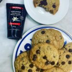 Chrissie Swan Instagram - Cookie time! 🍪 Slide for finished product! My daughter started a little business in lockdown by making epic choc chip cookies and since then we’ve always had them in the pantry. I used this recipe from Queen and it certainly did not disappoint - there’s cream cheese in it for a start which I’d never encountered in a cookie recipe and it adds a little je ne sais quoi. Actually I made a double batch and froze the extra one in balls ready for next week… I added more of the vanilla paste though because I’m crazy like that - go for 2 tablespoons. See my stories for a tip on how to make them all uniform and fancy! Here’s the recipe cos I know you’re gonna ask! WHAT YOU’LL NEED * 2 3/4 cups plain flour * 1 teaspoon baking soda * 1 teaspoon baking powder * 2 teaspoons cornstarch * 1 teaspoon sea salt * 140 grams unsalted butter, at room temperature * 1/4 cup cream cheese, at room temperature * 1 1/4 cups brown sugar * 1/2 cup caster sugar * 1 1/2 teaspoons Queen vanilla paste (I used 2 tablespoons) * 2 large eggs * 2 cups dark choc chips WHAT TO DO: 1. Preheat oven to 180ºc. Line baking sheets with parchment paper. 2. Whisk together flour, baking soda, baking powder, cornstarch and salt. 3. In the bowl of an electric mixer, beat the butter, cream cheese and sugars on until light and creamy. Add in the vanilla and the eggs, one at a time, beating well after each addition. Slowly beat in the flour mixture and stir in the choc chips.  5. Using a 1/4 cup measuring cup measure out balls and push into a cookie cutter onto the tray. Squash a little bit. 6. Bake for 10 to 11 minutes, or until barely golden brown. Scoff! #ad @queenfinefoods #queenbaking #alittlequeendoeswonders