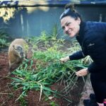 Chrissie Swan Instagram – Take a break from obsessing about @taylorswift for just one RED second and enjoy this pic of me feeding bamboo to a capybara @tarongazoo … We ride tomorrow, Swifties! ❤️