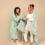 Chrissy Teigen Instagram - it’s PISTACHIO launch day over at @cravingsbychrissyteigen but here at the house it is a **LIFESTYLE** - shop our COVETED (seriously, if you have one of the other colors, you already know!!) teddy robe in pistachio, or our pocketed snacking blanket TOOOOODAY!!!!