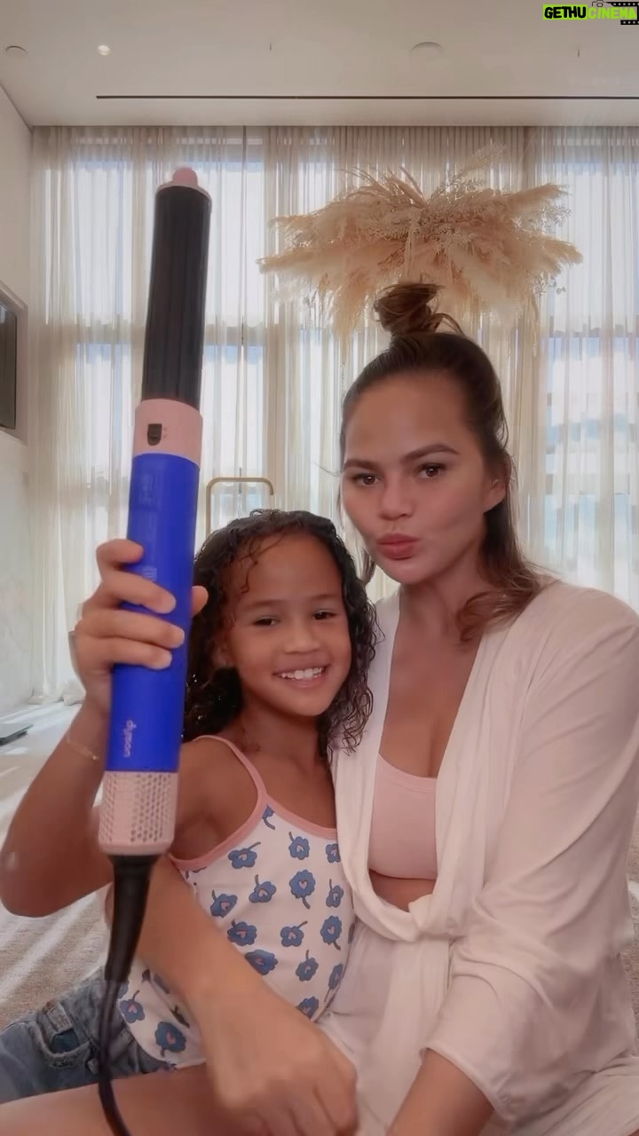Chrissy Teigen Instagram - Happy Black Friday weekend from me, Toons, and @dysonusa! #ad #dysonpartner #dysonairwrap @dysonhair