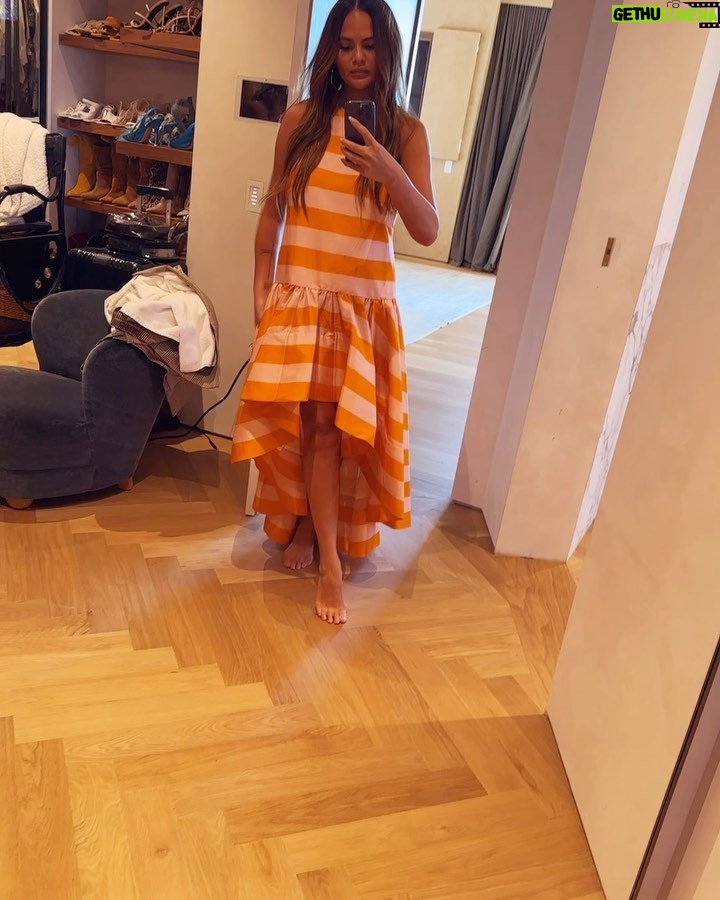Chrissy Teigen Instagram - this dress makes me very happy 🧡 @zimmermann
