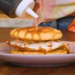 Chrissy Teigen Instagram - Upgraded homemade McGriddle? UPGRADED HOMEMADE MCGRIDDLE! Oh baby was this good. I use my absolute favorite eggs from @happyeggcousa (the yolk is 😍) & of course my Buttermilk Mochi Pancake & Waffle Mix for the buns! This recipe is sooo delicious - it’s the perfect amount of sweet, savory, creamy, with a kick from the spicy mayo. Save this recipe, I promise you’re going to want to make it more than once! You’ll need: - 1 Cup Cravings Buttermilk Mochi Pancake & Waffle Mix - 2 TBSP Maple Syrup - 2 TBSP Canola Oil - 1/2 Cup Heavy Cream - 1/2 Cup Spicy Mayo - 1 Round Pork Sausage Patty, Cooked - 1 Heritage Egg by Happy Egg - Optional: Cheese of your choice Directions: - Make Cravings Buttermilk Mochi Pancake & Waffle Mix and drizzle with Maple Syrup before baking for perfectly sweet buns - Fry one Happy Egg - Cook sausage patty according to instructions - Cover one side of a Cravings Buttermilk Mochi Pancake with spicy mayo, stack the sausage and fried Heritage Egg on top, drizzle with more Maple Syrup, and top with a second pancake - Optional: Add your cheese of choice - Enjoy!