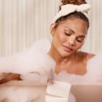 Chrissy Teigen Instagram - Let’s be honest about why cleansing bars are better. If you are taking a bath, it is because u wanna be a lazy daisy. And if you need to soap up your body and only have body wash, you have to stand in the tub and that’s exhausting. A bar u can continue to be lazy. Thank u.