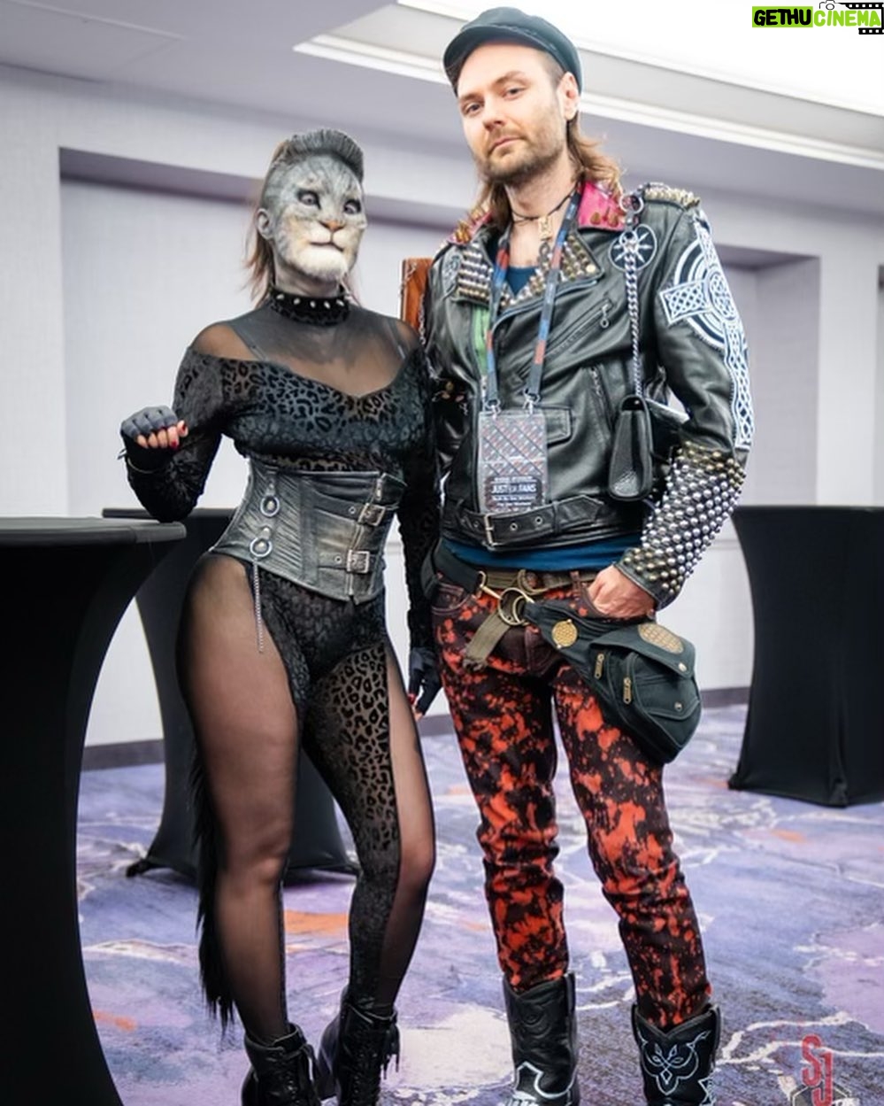 Cig Neutron - 685 Likes - @rannieaugogo and I had the most incredible time at @theofficialdomcon I have such a deep respect for Dommes and the work that they do. Thank you so much @theofficialporcelainmidnight for inviting us, showing us around, and sharing your wisdom with us. Check out episode 116 of Spewtron where I interview Mistress Porcelain. My amazing jacket by @battle.jacket.bill if anyone knows the wonderful photographers IG please tag. #dom #domcon #domconla #battlejacket #cat #pet
