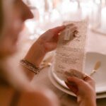 Connar Franklin Instagram – everything was perfect 🤍… my mom & @kaycha hand-sew every name onto those menus 🥹 they also painted and hand glued moss onto the piano but that will get its own moment. 

planning + event design @samkoma.world
photography  @josevilla
venue  @biltmoreestate
wedding publicist:  @beinspiredpr
florals @stellarosefloral
rentals + draping @whitedoorevent
tabletop rentals @curatedeventscharlotte
stationery @katewisemancreative
wedding dress @eliesaabbridal from @loho_bride
reception dresses @daniellefrankelstudio from @loho_bride 
rehearsal dress @alexiamariaofficial
bridal makeup @jentioseco
bridal hair  @flawlessairbrush
nails @tombachik
bridesmaid dresses  @verawangbride
groom’s tuxedo @tomford
touch up station: @rarebeauty 
groomsmen attire @generationtux
stone dress replica @stonewear_ceramics
wedding scent @snif.co
monogram art by celebrity tattoo artist @theghostkat
watercolor artist @alyssa_faye_simpson
stir sticks, napkins, matches, + water bottles @poppyjackshop
cake @biltmoreestate
photo booth @majesticbooths
dj @entertainofficial
videography @taylorthibeau
getaway car @coatscars