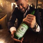 Conor McGregor Instagram - Here’s a crisp and fresh proper gift for the holidays: Proper No. Twelve Irish Apple. What’cha want— @thenotoriousmma to put a fookin’ bow on it?! 🥃🍏🎁