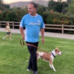 Craig Shoemaker Instagram - Daughter photo bomb. Walking our new dog, Buffy, rescued last month from a local shelter. Part Pit, and ppl are often afraid, walking to the other side of the street. Buffy is so sweet. Goes to show you how propaganda and prejudice works, with fear taking over and bad reactions causing conflict. Maybe this is why she loves me so much? Being a big white guy, people make assumptions about me all the time!