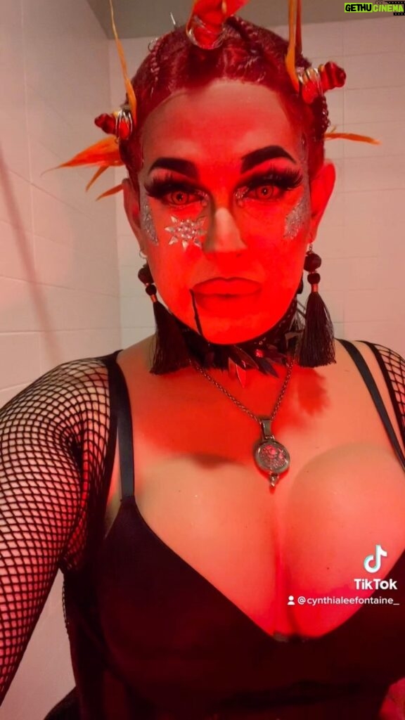 Cynthia Lee Fontaine Instagram - #bts from my #visualizer for my song #tuyyo this sexy vampire look inspired in early 2000,s fashion and I get to wear my tetas 🔥 🎃 4 days till Halloween! What will be your costume ? 🎃And stream and ad my song and remix to your fav #halloween playlist ! #fyp #viral #rupaulsdragrace #musica #reggaeton #pop #dragsinger #support #viral #vampira #artists #cantante