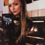 Daisy Coleman Instagram - What’s better than curling up next to the fireplace with a mug of hot coco while it’s snowing? The answer is curling up next to the fireplace with a mug of coco that I can smoke out of in my new socks from @inkedmag 😍 I think I might need five more of these because they’re just so perfect for the Holliday’s and stocking stuffers 🎅🏼🎄❄️❤️💚 #inkedholliday #inkedshop Use my code YOUNGCATTATTOOSINKEDHOLIDAY and link https://glnk.io/4y9/youngcattattoosinked to get a special discount 😍💚❤️