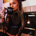 Daisy Coleman Instagram - What’s better than curling up next to the fireplace with a mug of hot coco while it’s snowing? The answer is curling up next to the fireplace with a mug of coco that I can smoke out of in my new socks from @inkedmag 😍 I think I might need five more of these because they’re just so perfect for the Holliday’s and stocking stuffers 🎅🏼🎄❄️❤️💚 #inkedholliday #inkedshop Use my code YOUNGCATTATTOOSINKEDHOLIDAY and link https://glnk.io/4y9/youngcattattoosinked to get a special discount 😍💚❤️