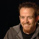 Dave Farrell Instagram - Hybrid Theory turns 22! As a 22 year-old, our oldest child (with any luck) would be finishing college this year, which is almost the exact time period in our lives when we were writing, recording, and then touring the album. In our early twenties there was nothing we liked better than a fun prank, and the end of a tour always provided a perfect opportunity. On the last show of one particular tour, the band @deadsy had a stage design that had always reminded me of an astroturf miniature golf course. I, having just taken up the game of golf, and Mike, always willing to participate in shenanigans, thought it might be fun to grab a ball and some clubs and “play through” the middle of Deadsy’s set. In the last moments building up to us “teeing off” onto their stage, Mike decided to craft a golf flag out of stage materials and gaff tape. In a matter of minutes, Mike put his art skills to work and built what I remember as the largest golf flag I’d ever seen. It seemed ridiculously large, but somehow ended up working perfectly with the size of the stage. It was a wonderful time that marked the beginnings of great things to come for Linkin Park’s future, and mediocre to average things to come for my golf game 😂. As a side note, I think most would be happy to know that my sartorial choices have slightly improved (I hope) when it comes to my choice of “on course attire!” Added a fun pic from this year’s Dunhill Links Championship with my pro teammate Russell Chrystie (russchrystie) - @phoenixlp