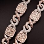 Davido Instagram - Davido’s bespoke pendant, dedicated to the success of his new album ‘Timeless’. A timeless ‘hourglass’ design, crafted with meticulous detail and hand selected diamonds. A moving hourglass, enclosed with diamond dust. A 350ct diamond pendant, weighing 1.5kg. Crafted with meticulous attention to detail. This exquisite pendant features hand-picked diamonds, constructed with a 1 carat pear diamond above the pendant. 4 - 0.5ct pear diamonds in the centre. A 30 pointer boarder for ‘30 Billion Gang’, as well as a 30 pointer boarder around the hourlgass. ‘30BG’ across the bespoke cuban chain. ‘30BG’ Baguette cut display. Designed in-house by our Local Kettle Brothers jewellery specialist team Cole, Emmanuel and Ethan. The "Timeless" pendant is a breathtaking masterpiece designed exclusively for Davido. A true embodiment of Davido’s unique style, the "Timeless" pendant is a symbol of inspiration, creativity, and enduring beauty that will adorn the wearer for generations to come.