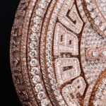 Davido Instagram - Davido’s bespoke pendant, dedicated to the success of his new album ‘Timeless’. A timeless ‘hourglass’ design, crafted with meticulous detail and hand selected diamonds. A moving hourglass, enclosed with diamond dust. A 350ct diamond pendant, weighing 1.5kg. Crafted with meticulous attention to detail. This exquisite pendant features hand-picked diamonds, constructed with a 1 carat pear diamond above the pendant. 4 - 0.5ct pear diamonds in the centre. A 30 pointer boarder for ‘30 Billion Gang’, as well as a 30 pointer boarder around the hourlgass. ‘30BG’ across the bespoke cuban chain. ‘30BG’ Baguette cut display. Designed in-house by our Local Kettle Brothers jewellery specialist team Cole, Emmanuel and Ethan. The "Timeless" pendant is a breathtaking masterpiece designed exclusively for Davido. A true embodiment of Davido’s unique style, the "Timeless" pendant is a symbol of inspiration, creativity, and enduring beauty that will adorn the wearer for generations to come.